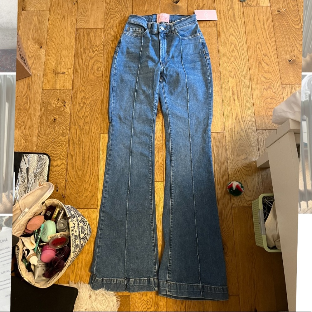 Never worn size 27 Revice jeans with star stitching